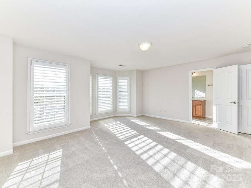 7854 Springs Village Lane, Charlotte, NC 28226.  MLS# CAR4240846, YatesRealty ID 16170. Bedroom 2- NEW CARPET
