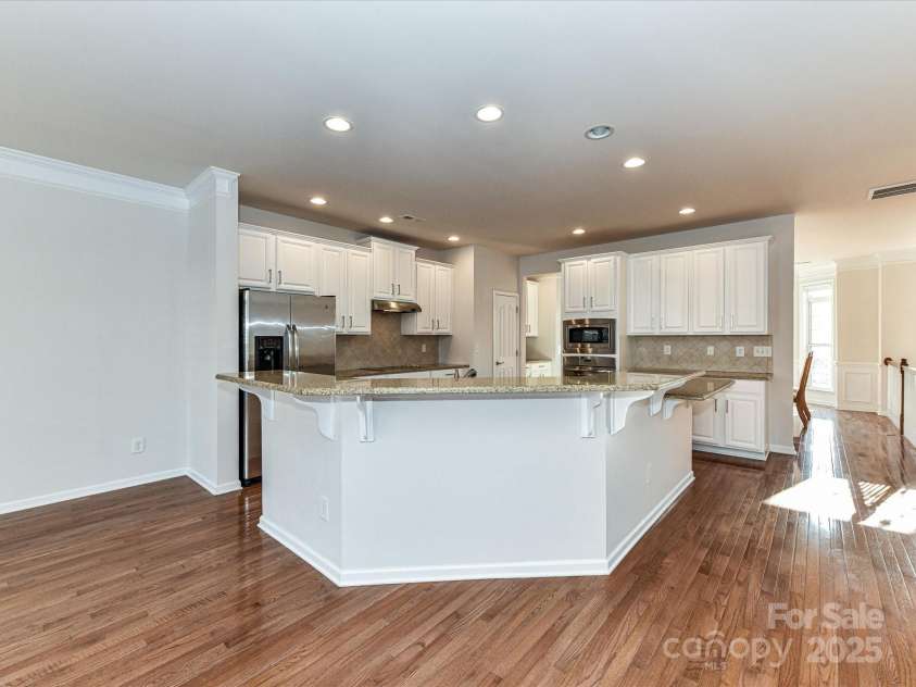7854 Springs Village Lane, Charlotte, NC 28226.  MLS# CAR4240846, YatesRealty ID 16170. Large Bar with Seating