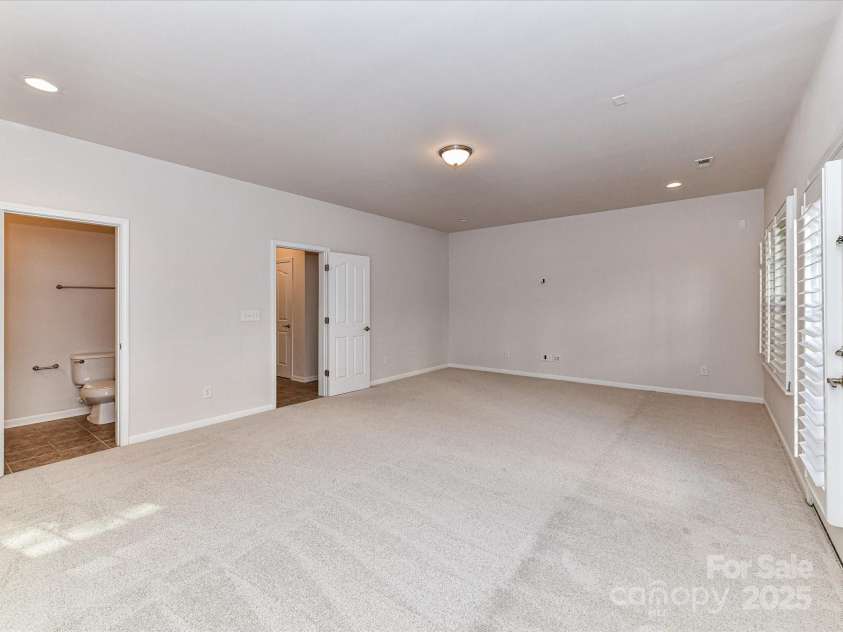 7854 Springs Village Lane, Charlotte, NC 28226.  MLS# CAR4240846, YatesRealty ID 16170. Lower Level Bedroom or Bonus - NEW CARPET