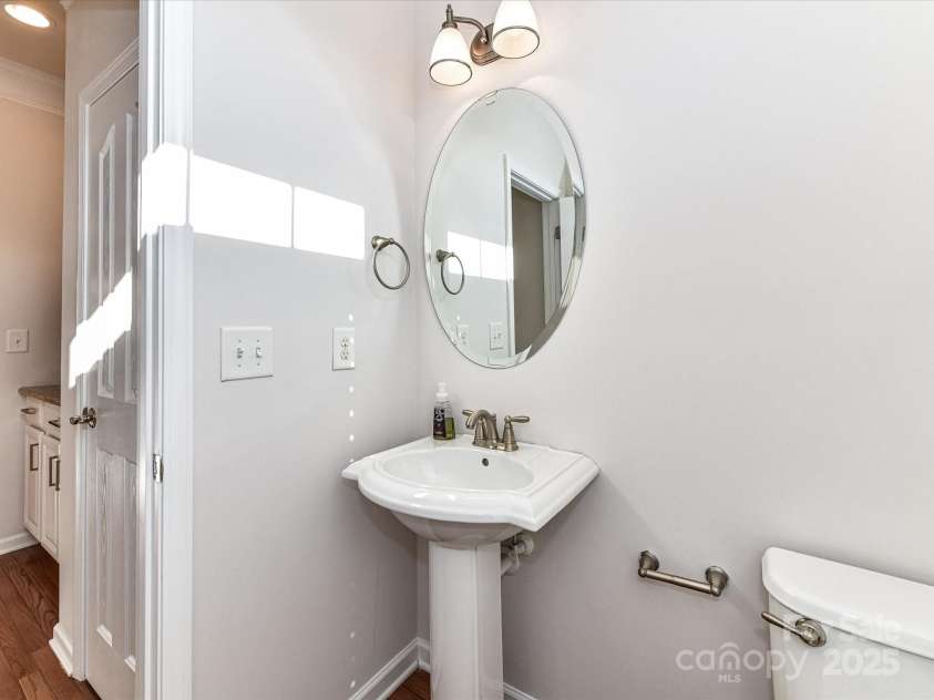 7854 Springs Village Lane, Charlotte, NC 28226.  MLS# CAR4240846, YatesRealty ID 16170. Powder Room on Main Level