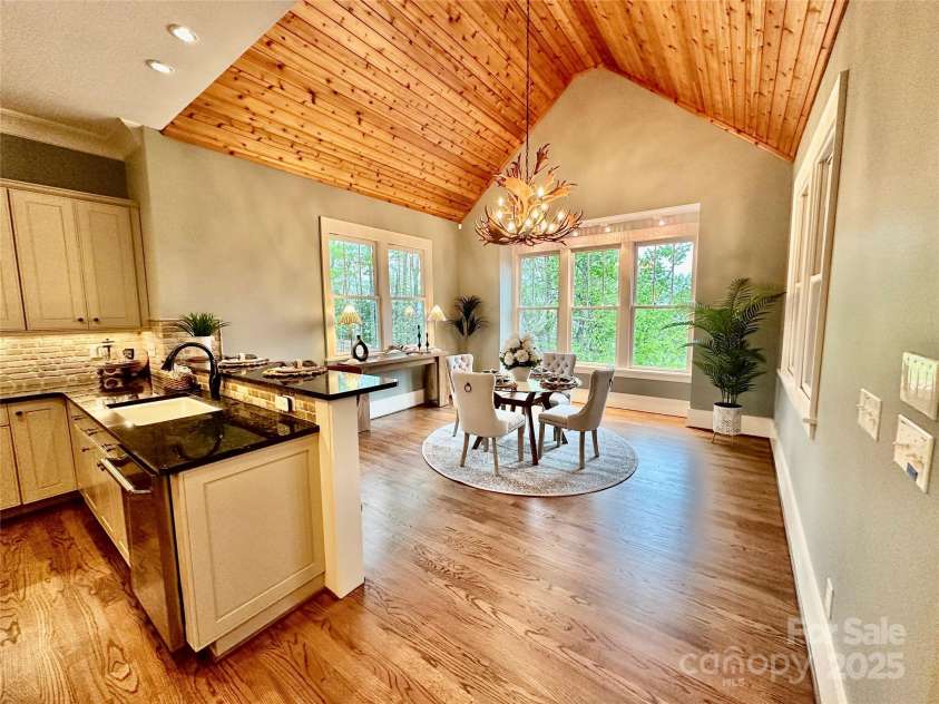 18420 Rosapenny Road, Charlotte, NC 28278.  MLS# CAR4240682, YatesRealty ID 16172. Open Concept Kitchen to Dining Area overlooking the lake