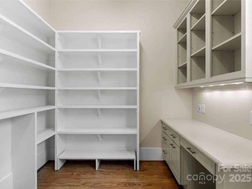 18420 Rosapenny Road, Charlotte, NC 28278.  MLS# CAR4240682, YatesRealty ID 16172. Walk in Pantry at main level kitchen with desk