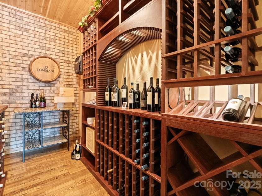 18420 Rosapenny Road, Charlotte, NC 28278.  MLS# CAR4240682, YatesRealty ID 16172. Wine cellar in walkout basement