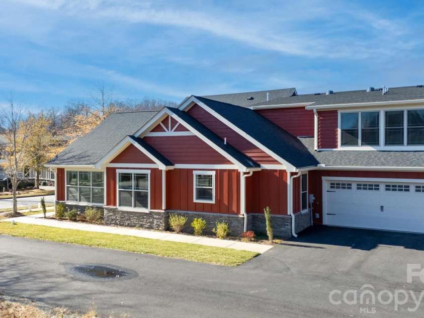 20 Brookstone Place, Candler, NC 28715.  MLS# CAR4368758, YatesRealty ID 16172. Exterior side view