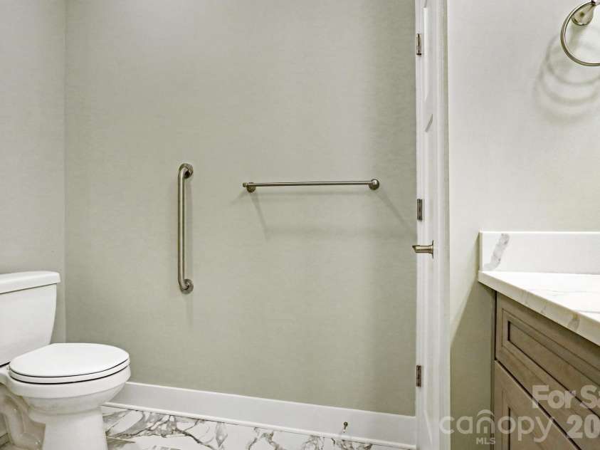 20 Brookstone Place, Candler, NC 28715.  MLS# CAR4368758, YatesRealty ID 16172. Primary Bathroom