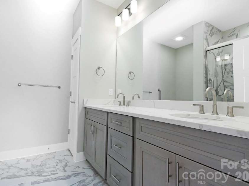 20 Brookstone Place, Candler, NC 28715.  MLS# CAR4368758, YatesRealty ID 16172. Primary Bathroom w/Dual Sinks