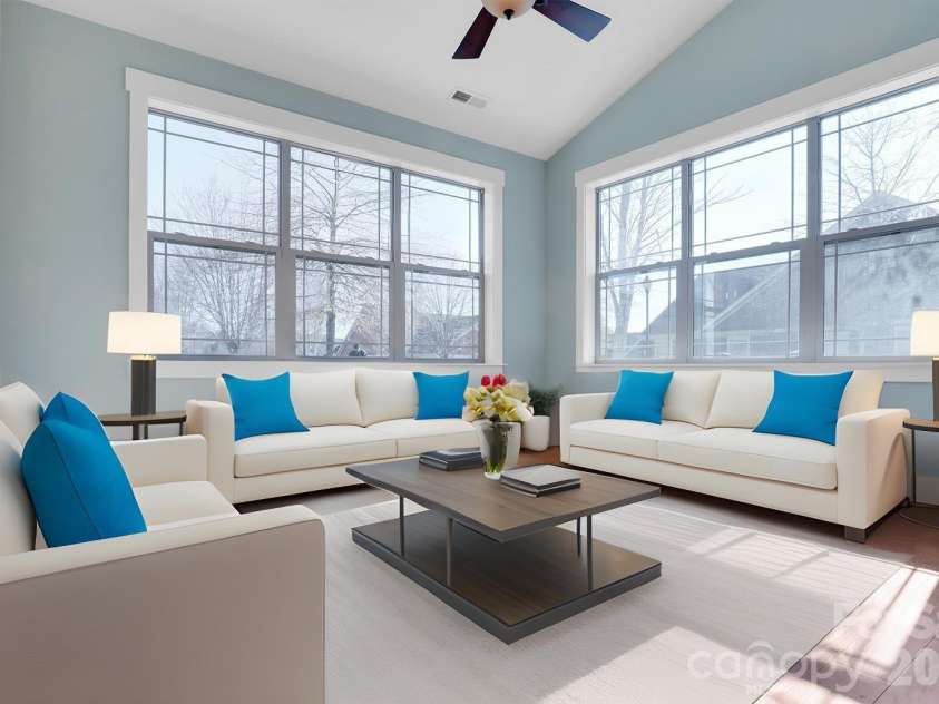 20 Brookstone Place, Candler, NC 28715.  MLS# CAR4368758, YatesRealty ID 16172. Sunroom (virtually staged)
