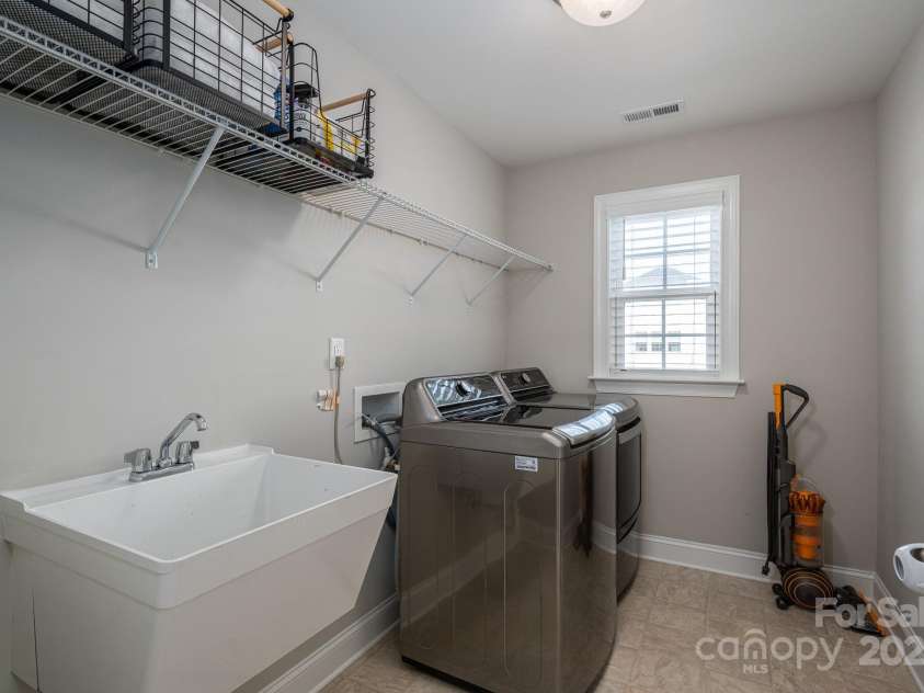 3017 Winged Teal Court, Belmont, NC 28012.  MLS# CAR4248943, YatesRealty ID 16179. UPSTAIRS LAUNDRY