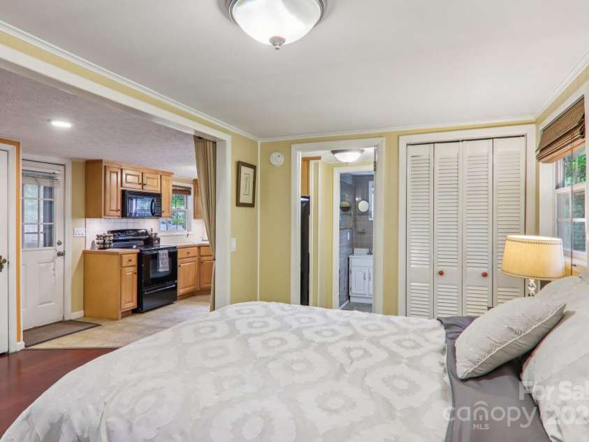 416 Cherokee Avenue, Black Mountain, NC 28711.  MLS# CAR4330813, YatesRealty ID 1618. 2LQ Bedroom > Kitchen