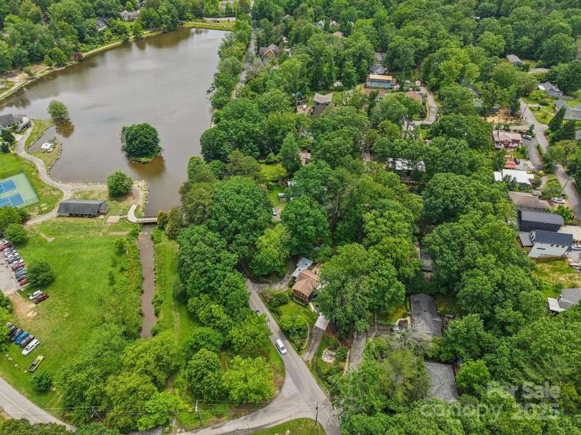 416 Cherokee Avenue, Black Mountain, NC 28711.  MLS# CAR4330813, YatesRealty ID 1618. Lake Tomahawk with Playground, Walking Trail, Pool, and Tennis Courts