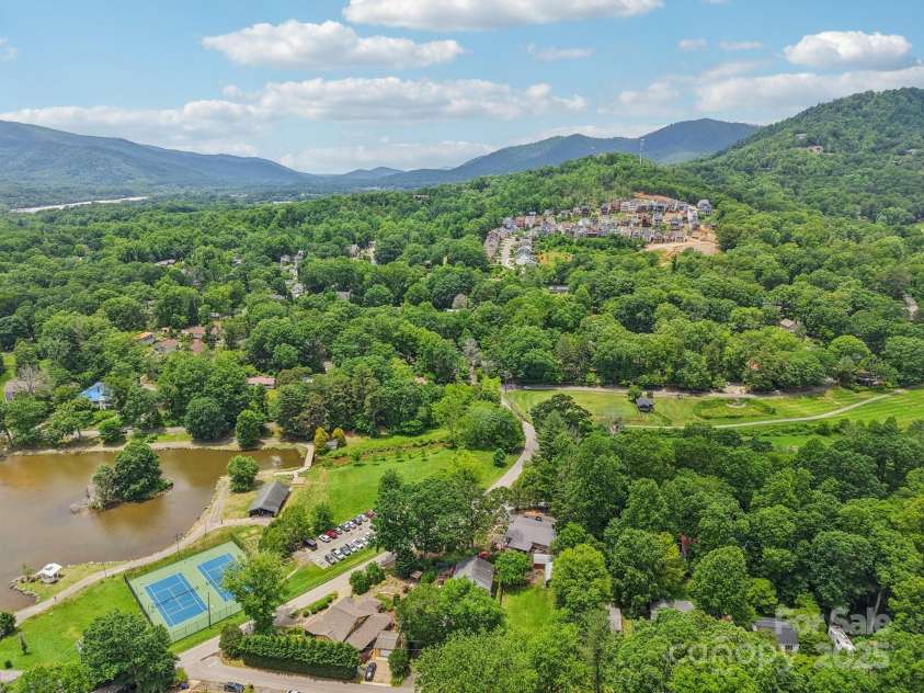 416 Cherokee Avenue, Black Mountain, NC 28711.  MLS# CAR4330813, YatesRealty ID 1618. Lake Tomahawk with Playground, Walking Trail, Pool, and Tennis Courts