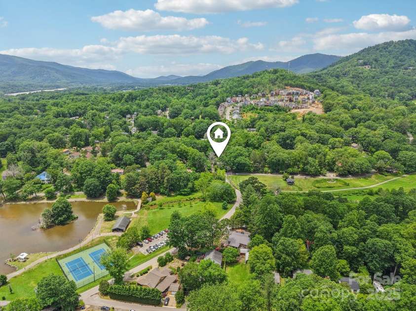 416 Cherokee Avenue, Black Mountain, NC 28711.  MLS# CAR4330813, YatesRealty ID 1618. Lake Tomahawk with Playground, Walking Trail, Pool, and Tennis Courts