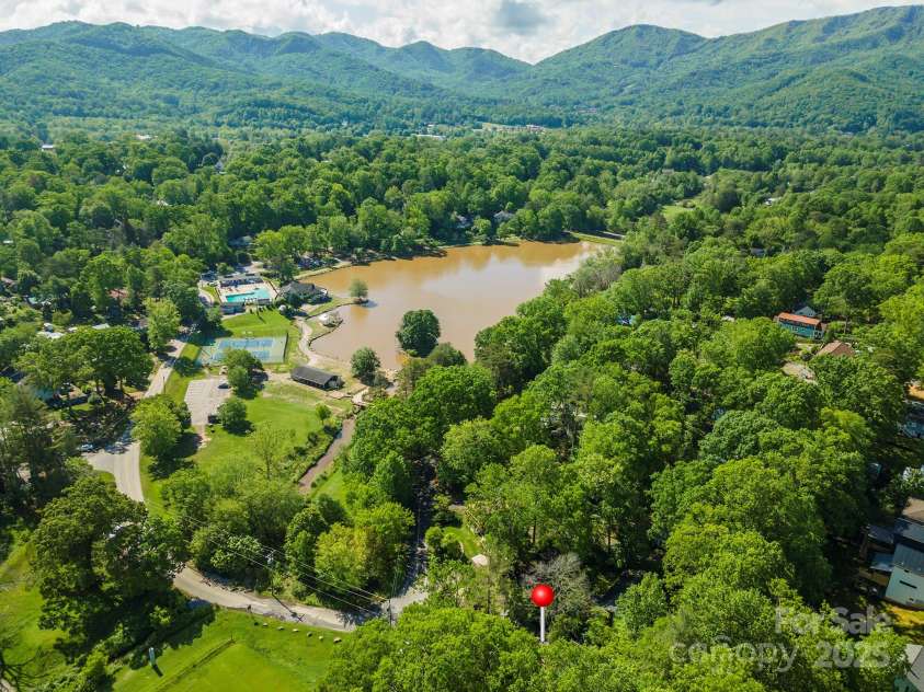 416 Cherokee Avenue, Black Mountain, NC 28711.  MLS# CAR4330813, YatesRealty ID 1618. Lake Tomahawk with Playground, Walking Trail, Pool, and Tennis Courts