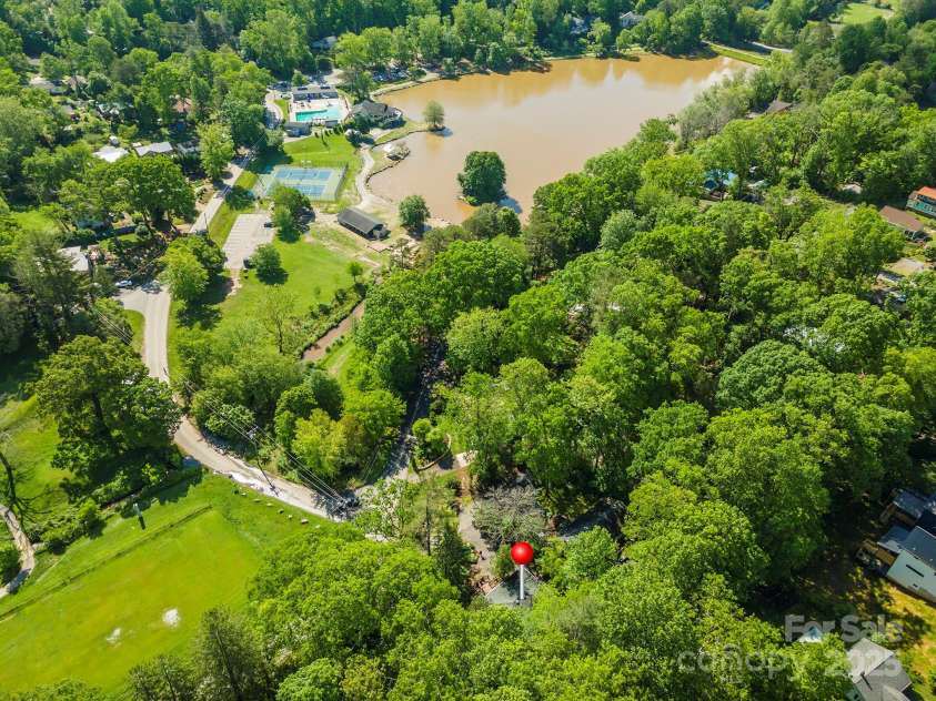 416 Cherokee Avenue, Black Mountain, NC 28711.  MLS# CAR4330813, YatesRealty ID 1618. Lake Tomahawk with Playground, Walking Trail, Pool, and Tennis Courts