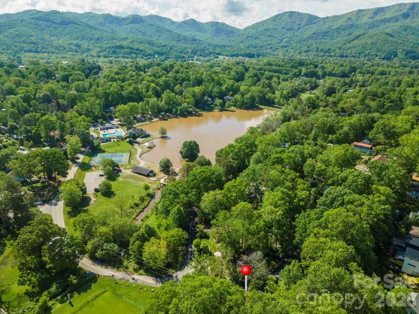 416 Cherokee Avenue, Black Mountain, NC 28711.  MLS# CAR4330813, YatesRealty ID 1618. Lake Tomahawk with Playground, Walking Trail, Pool, and Tennis Courts