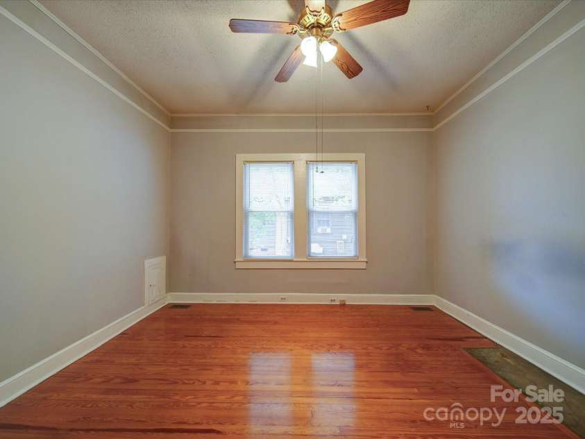 318 Chestnut Avenue, Kannapolis, NC 28081.  MLS# CAR4260562, YatesRealty ID 16180. Ceiling fan in primary bedroom.