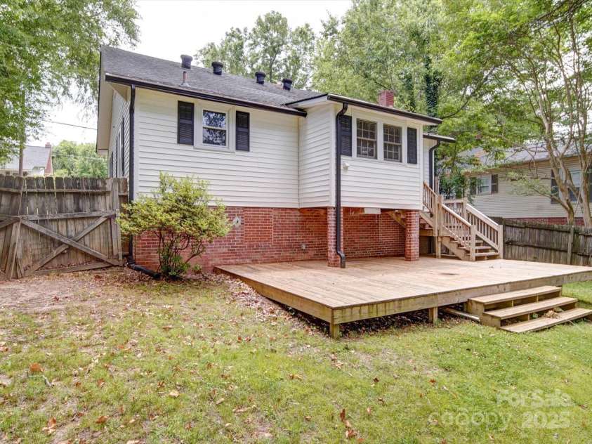 318 Chestnut Avenue, Kannapolis, NC 28081.  MLS# CAR4260562, YatesRealty ID 16180. Newer large back deck for entertaining, grilling, etc.