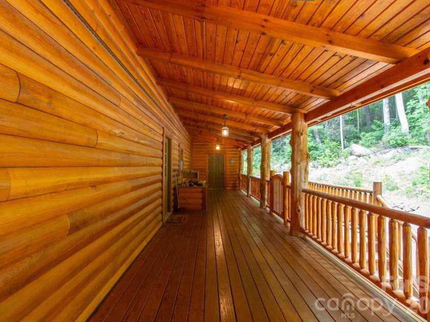 2811 Poplar Creek Road, Green Mountain, NC 28740.  MLS# CAR4370609, YatesRealty ID 16187. Back porch