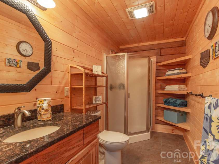 2811 Poplar Creek Road, Green Mountain, NC 28740.  MLS# CAR4370609, YatesRealty ID 16187. Guest bathroom