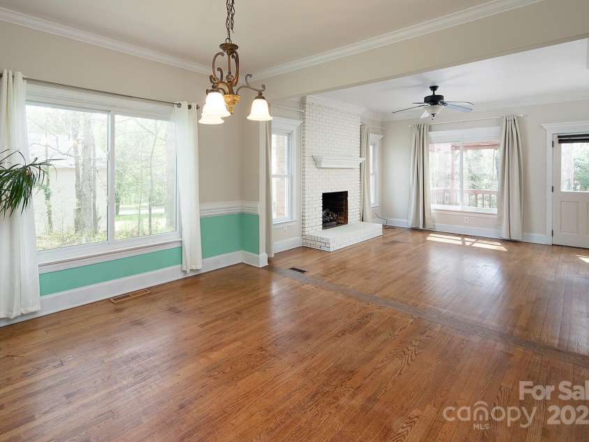 7007 Chapparall Lane, Charlotte, NC 28215.  MLS# CAR4223263, YatesRealty ID 16192. Flow from dining room into Family Room