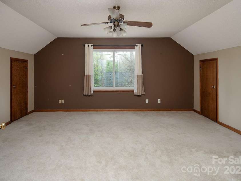 7007 Chapparall Lane, Charlotte, NC 28215.  MLS# CAR4223263, YatesRealty ID 16192. Large 2nd bedroom with large walk-in attic
