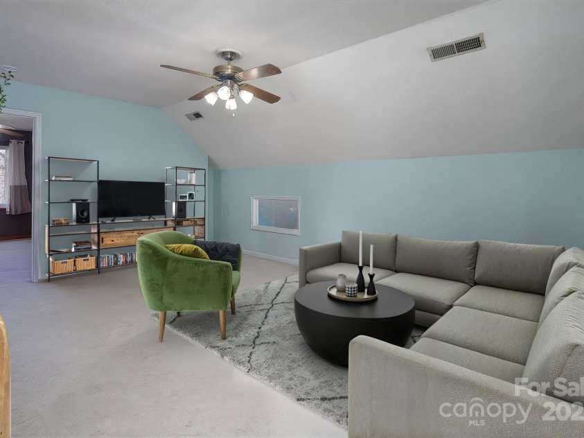 7007 Chapparall Lane, Charlotte, NC 28215.  MLS# CAR4223263, YatesRealty ID 16192. Loft upstairs - virtually staged