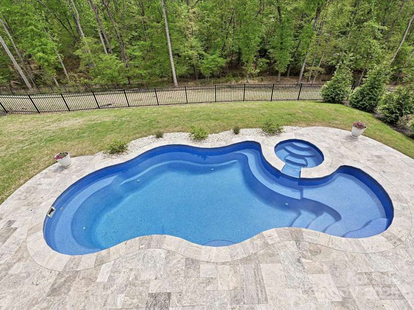 10035 Mast Cove Lane, Charlotte, NC 28278.  MLS# CAR4246317, YatesRealty ID 16193. Heated Salt Water Pool