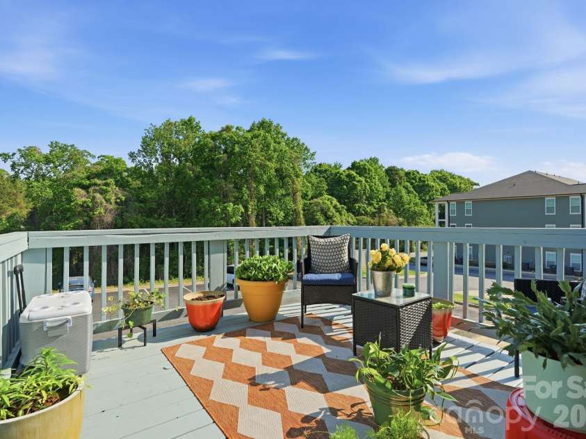119 Steam Engine Drive, Mooresville, NC 28115.  MLS# CAR4374818, YatesRealty ID 16195. Relax on the Charming Back Deck