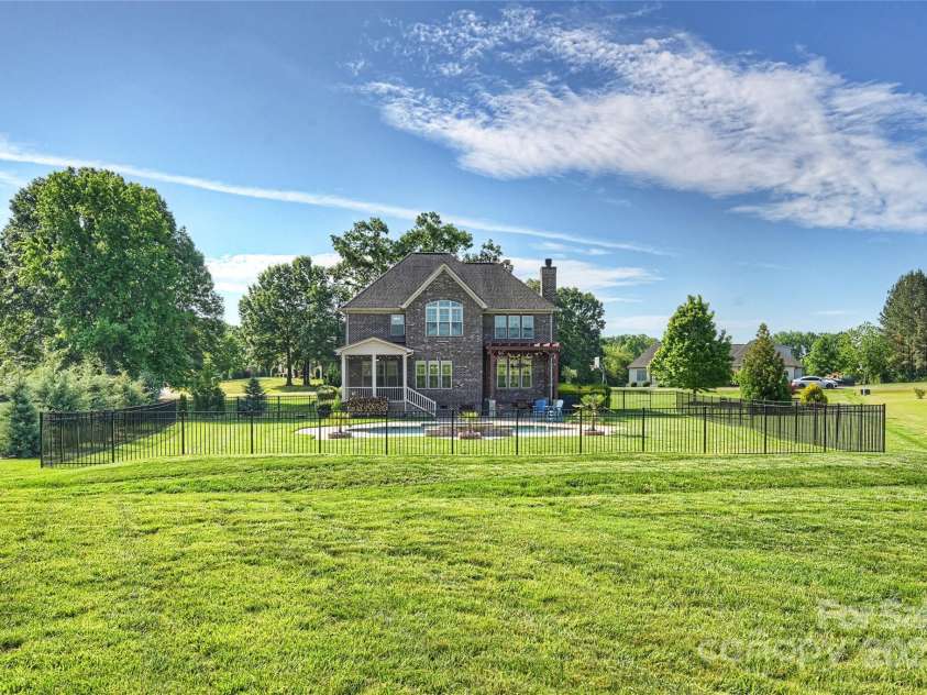 4941 Campobello Drive, Monroe, NC 28110.  MLS# CAR4257643, YatesRealty ID 16195. Rear Exterior