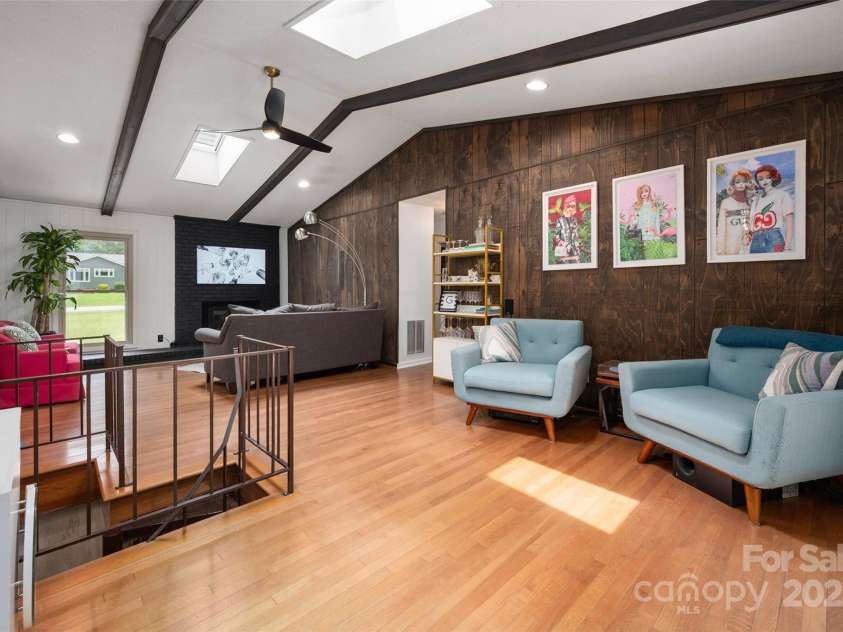 2298 Wintercrest Drive, Rock Hill, SC 29732.  MLS# CAR4264652, YatesRealty ID 16197. Spacious living room w/hardwood floors, vaulted ceiling, wood beams and gas fireplace