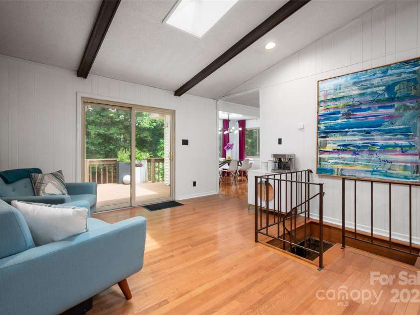 2298 Wintercrest Drive, Rock Hill, SC 29732.  MLS# CAR4264652, YatesRealty ID 16197. Spacious living room w/hardwood floors, vaulted ceiling, wood beams and gas fireplace