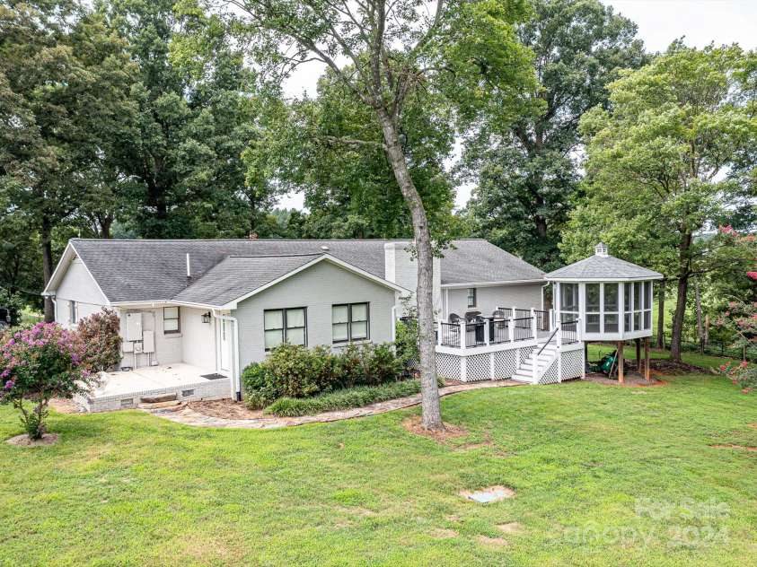 12136 Renee Ford Road, Stanfield, NC 28163.  MLS# CAR4165972, YatesRealty ID 162. Exterior view of home with gazebo