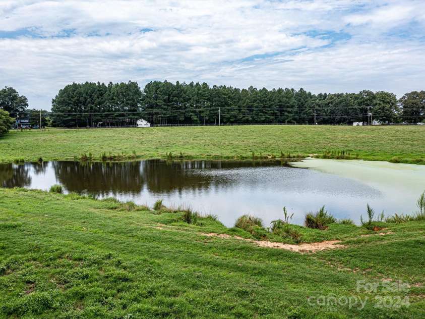 12136 Renee Ford Road, Stanfield, NC 28163.  MLS# CAR4165972, YatesRealty ID 162. Pond on property