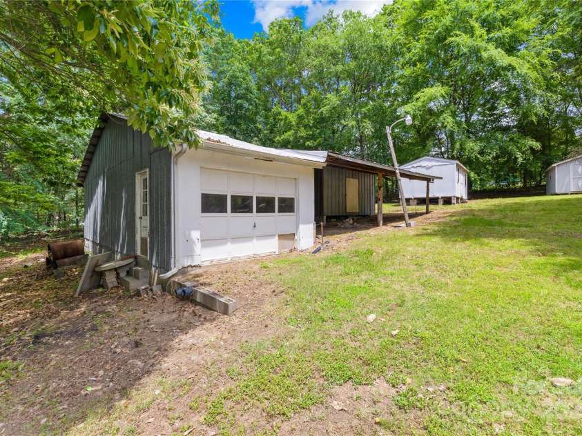 208 Lipe Road, Troutman, NC 28166.  MLS# CAR4263881, YatesRealty ID 16203. Detached garage and storage area