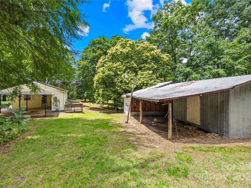 208 Lipe Road, Troutman, NC 28166.  MLS# CAR4263881, YatesRealty ID 16203. Looking towards house and garage