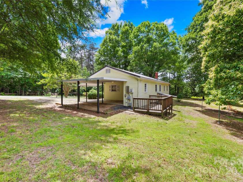 208 Lipe Road, Troutman, NC 28166.  MLS# CAR4263881, YatesRealty ID 16203. Side View of House