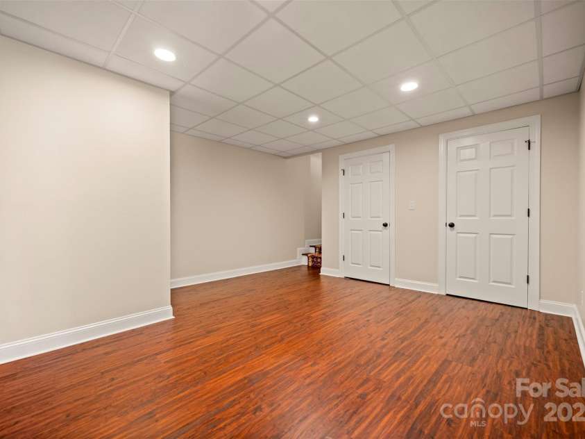 182 Kensington Drive, Forest City, NC 28043.  MLS# CAR4264053, YatesRealty ID 16207. Basement Den
