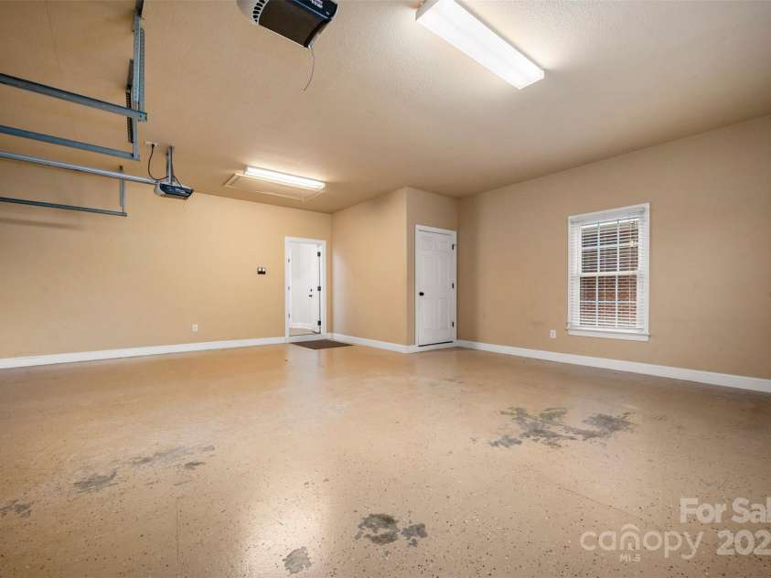 182 Kensington Drive, Forest City, NC 28043.  MLS# CAR4264053, YatesRealty ID 16207. Garage