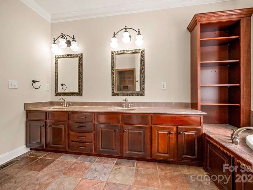 182 Kensington Drive, Forest City, NC 28043.  MLS# CAR4264053, YatesRealty ID 16207. Primary Bath