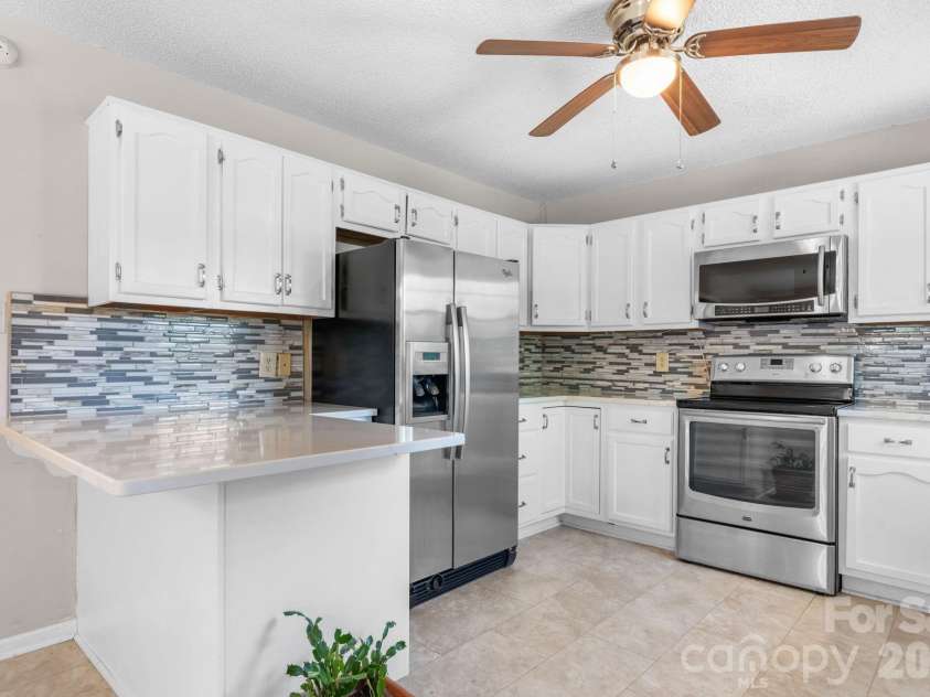 65 Pinewood Road, Granite Falls, NC 28630.  MLS# CAR4374012, YatesRealty ID 16209. 