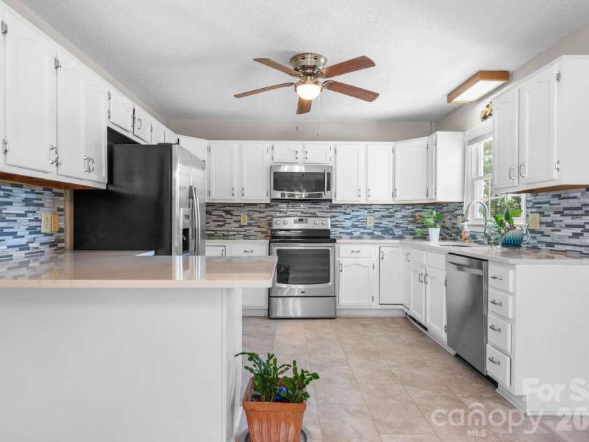 65 Pinewood Road, Granite Falls, NC 28630.  MLS# CAR4374012, YatesRealty ID 16209. 