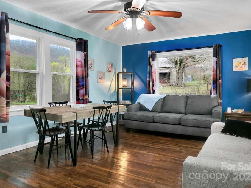 626 Fairview Loop, Hot Springs, NC 28743.  MLS# CAR4302454, YatesRealty ID 1621. Living Room, beautifully refinished Oak hardwood floors, looking from the hallway.