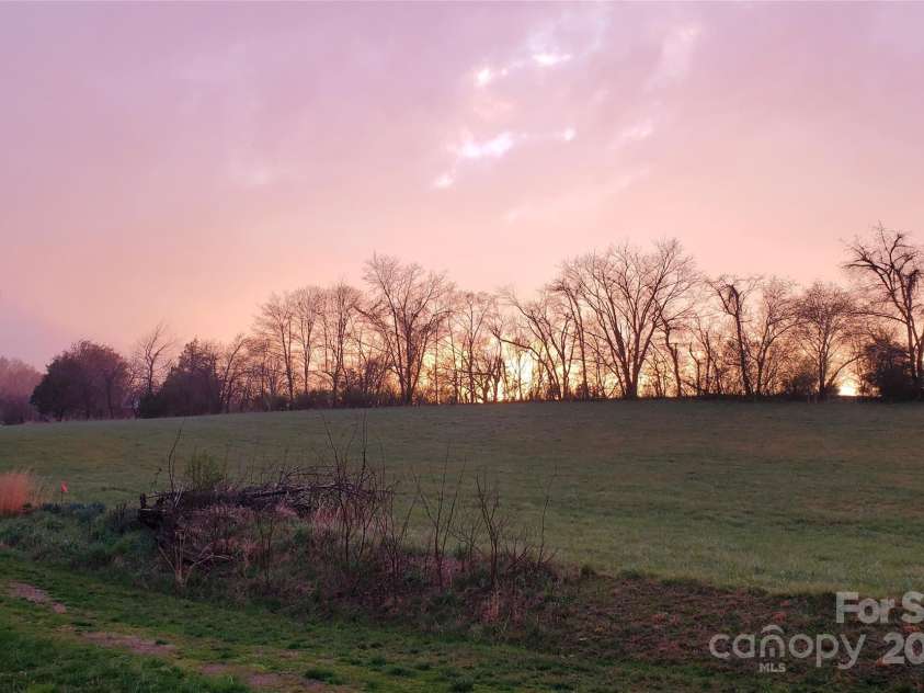 626 Fairview Loop, Hot Springs, NC 28743.  MLS# CAR4302454, YatesRealty ID 1621. Sunsets are also incredible to the west of the house, from both the front porch and the rear deck / hot tub!