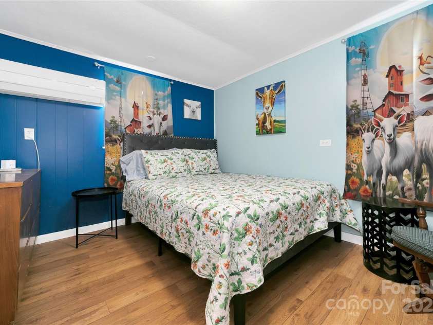 626 Fairview Loop, Hot Springs, NC 28743.  MLS# CAR4302454, YatesRealty ID 1621. The rear bedroom suite has its own thermostat and air-conditioning unit to allow a differential in temperature from the rest of the house if desired.