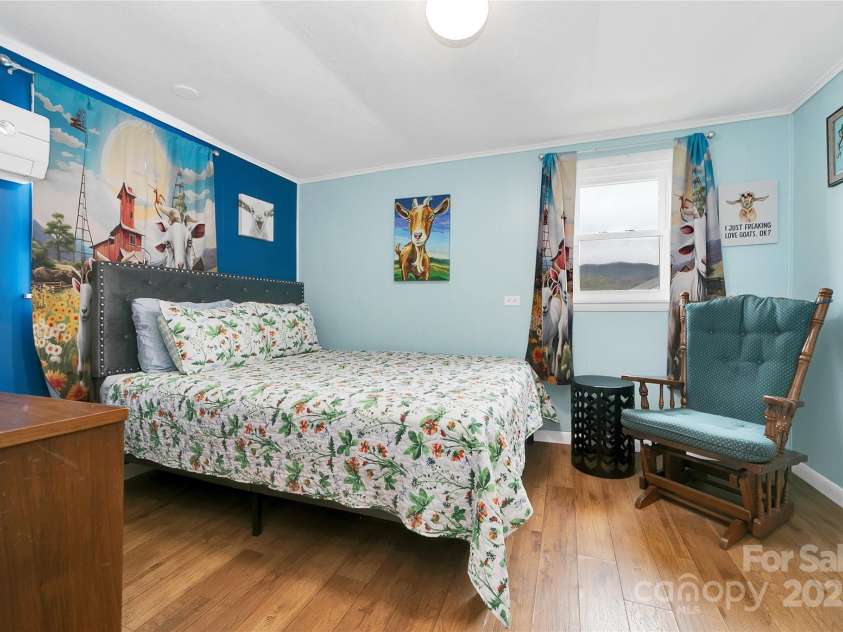 626 Fairview Loop, Hot Springs, NC 28743.  MLS# CAR4302454, YatesRealty ID 1621. The rear bedroom suite has its own thermostat and air-conditioning unit to allow a differential in temperature from the rest of the house if desired.