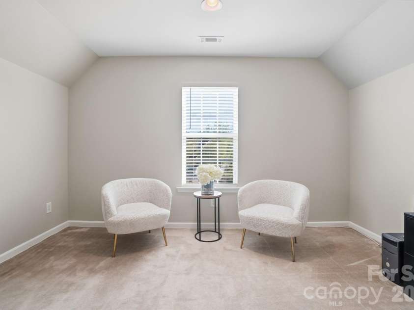 2109 Coral Berry Lane, Waxhaw, NC 28173.  MLS# CAR4360421, YatesRealty ID 16213. Primary bedroom lounge