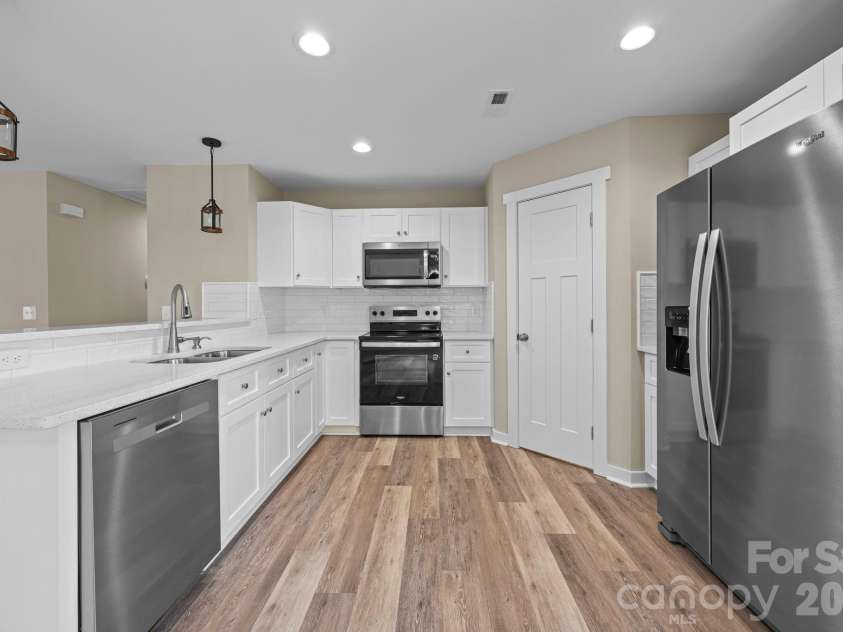 125 Doody Avenue, Norwood, NC 28128.  MLS# CAR4317866, YatesRealty ID 16217. Kitchen w Pantry