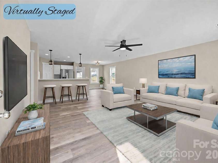 125 Doody Avenue, Norwood, NC 28128.  MLS# CAR4317866, YatesRealty ID 16217. Virtually Staged - Living Room