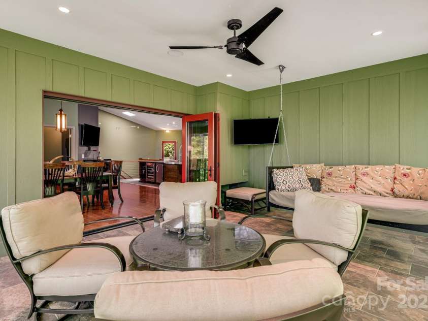 1760 Winding Creek Drive, Waynesville, NC 28786.  MLS# CAR4264715, YatesRealty ID 16223. Screened porch (3)