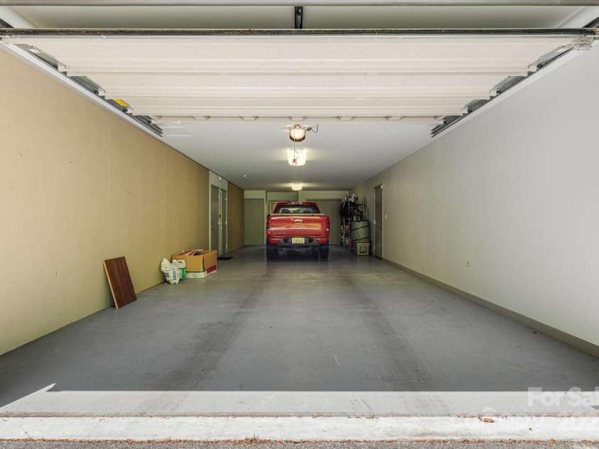 1760 Winding Creek Drive, Waynesville, NC 28786.  MLS# CAR4264715, YatesRealty ID 16223. Tandem 2 car garage